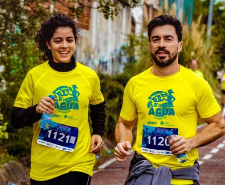 Two athletes participating in a marathon, showing determination and joy.